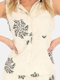 Woman's Elegant women's sleeveless blouse decorated with sequins