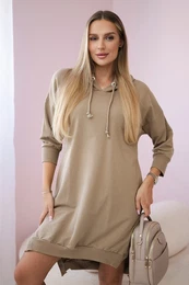 Dress with a hood and a longer rear camel