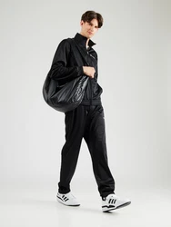 Champion Authentic Athletic Apparel Trainingsanzug 'ICONS' schwarz