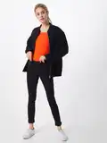 Oranžové skinny džíny image