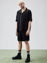 ABOUT YOU x Rewinside Shorts 'Aras' schwarz/weiß