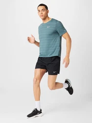 NIKE Sportshorts Dri-FIT Challenger schwarz / weiß