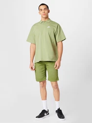 Nike Sportswear Poloshirt pastellgrün/weiß