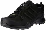 Schwarze Adidas Schuhe image