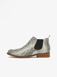 White women's leather chelsea boots with snake pattern