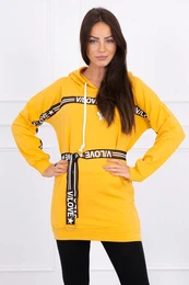 Dress decorated with a mustard inscription tape