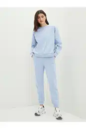 ensko besedilo je tiskalo tekae, puloverje z elastinim pasom.