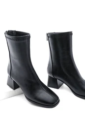 Dmsk boty na podpatku s plochou pikou a zipem vzadu Nayea ern