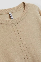 Sweater with openwork decoration
