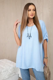 Oversized blouse with blue pendant