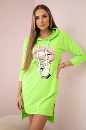 Dress with a longer back and a colorful green neon print