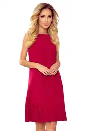 Trapezoidal dress with asymmetrical pleats