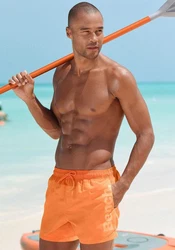 Bench. Badeshorts mit Logoschriftzug Orange/Gelb