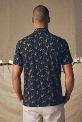 Next Poloshirt Polo-Shirt im weihnachtlichen Print 