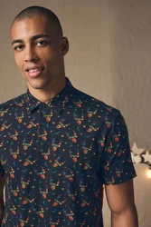 Next Poloshirt Polo-Shirt im weihnachtlichen Print 